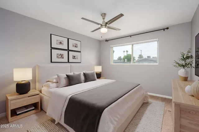 a view of a house with swimming pool and sitting area