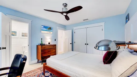 a view of a backyard with sitting area