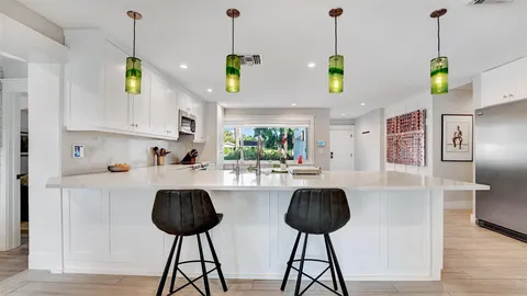 a view of a backyard of the house