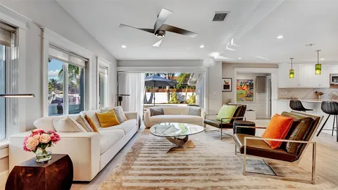 a living room with furniture and a gate