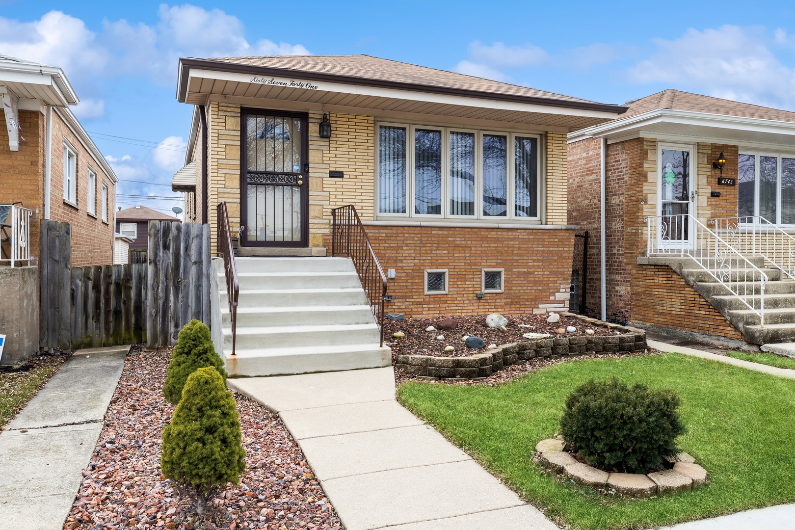 6741 West 59th Street Chicago, IL 60638 - Photo 2 of 16 a front view of a house