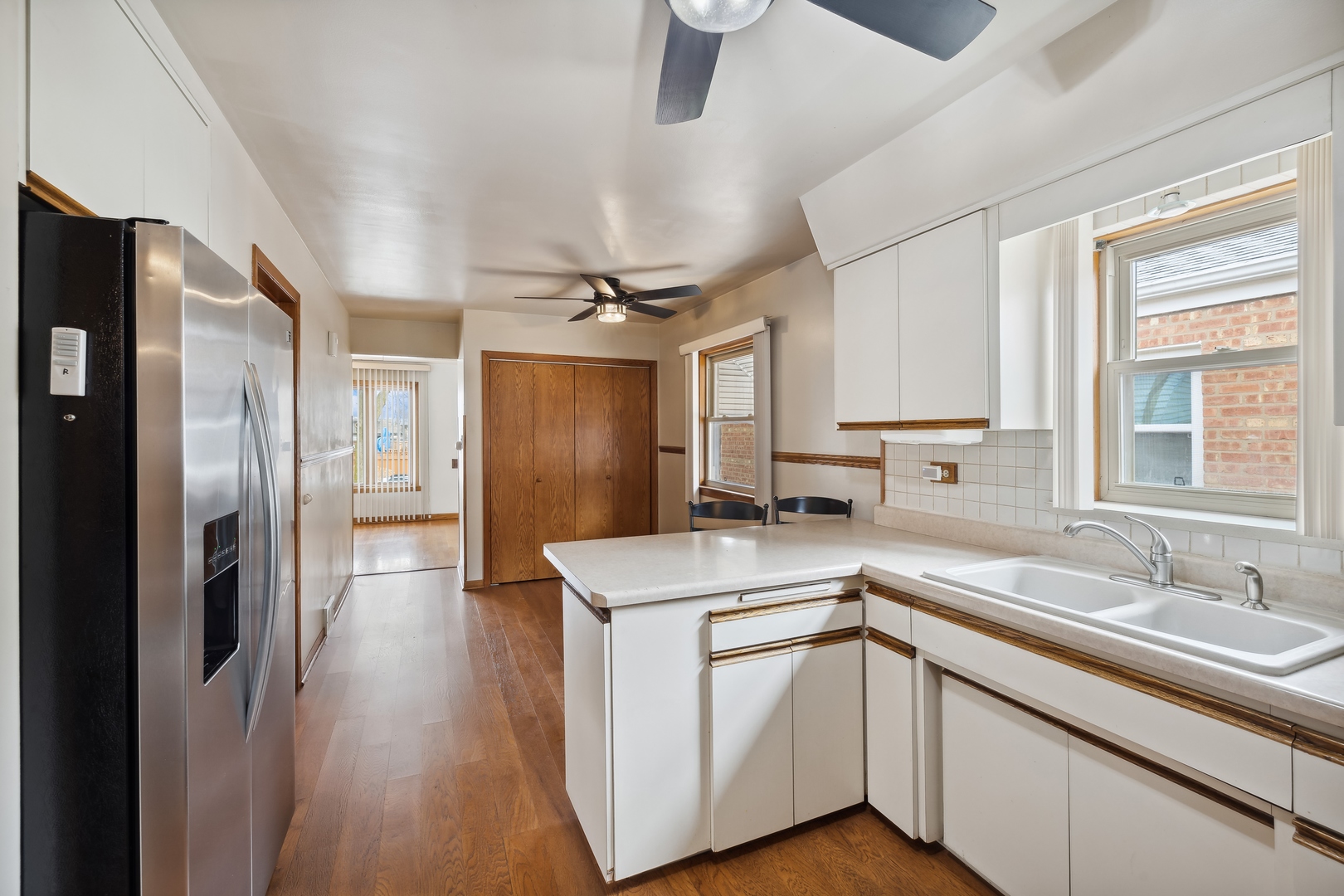 6741 West 59th Street Chicago, IL 60638 - Photo 8 of 16 a kitchen with stainless steel appliances a sink stove and refrigerator