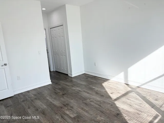 a view of a bathroom with a glass door