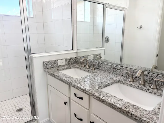 a view of a house with a yard porch and sitting area