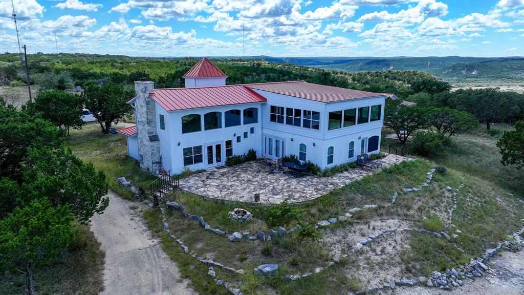 a view of a house with a garden
