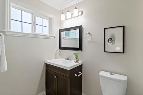 a view of a storage and utility room in a laundry room