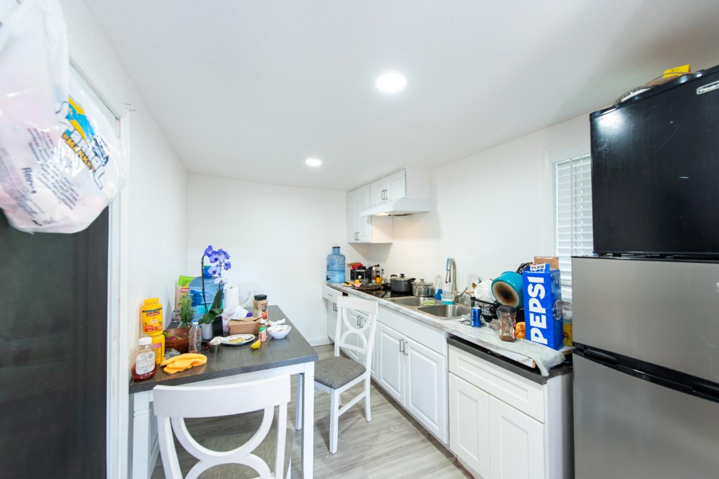 5798 Ribchester Court San Jose, CA 95123 - Photo 17 of 18 a kitchen that has a lot of cabinets and appliances