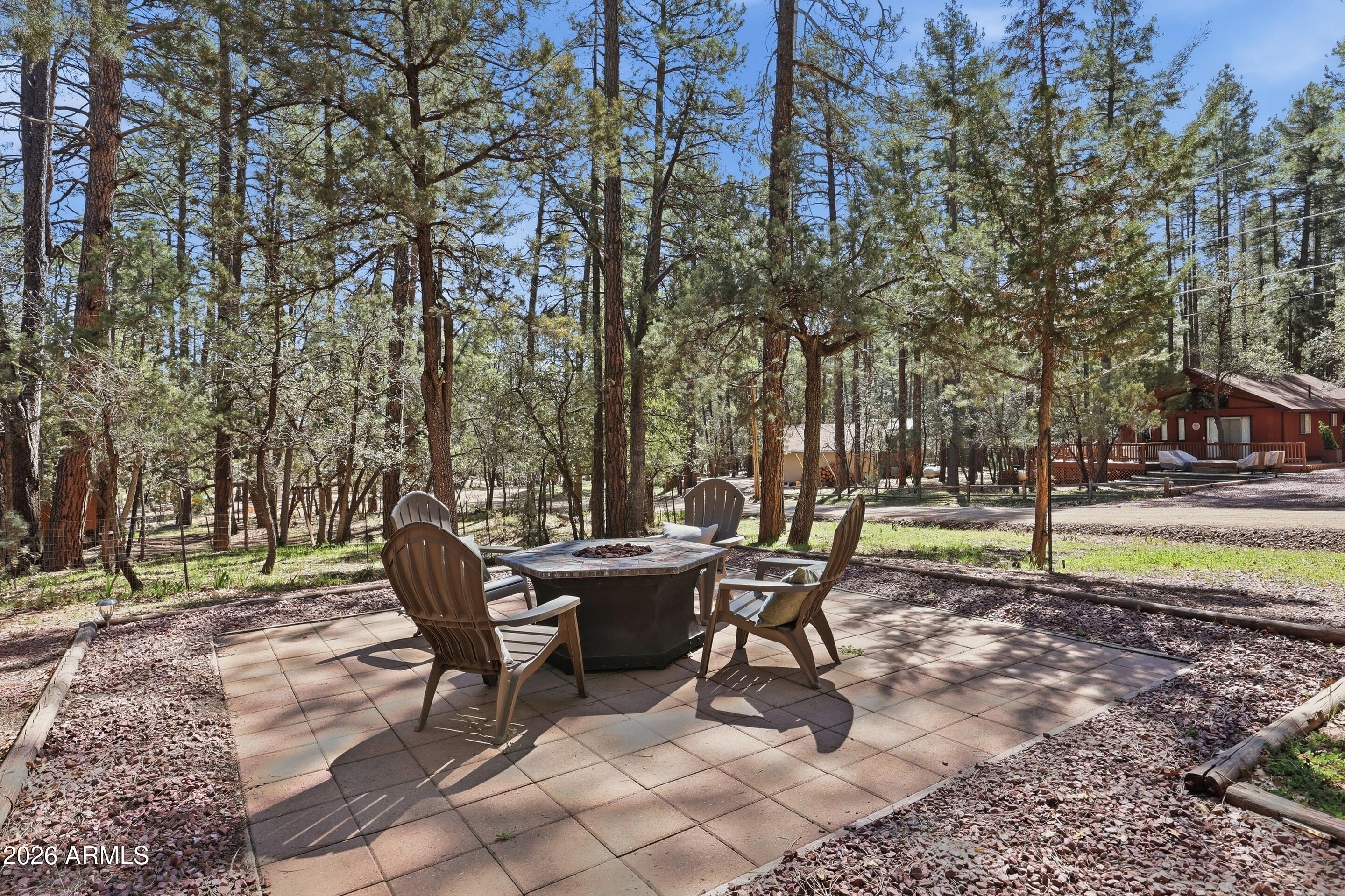 6740 Ridge Road Pine, AZ 85544 - Photo 33 of 35 a view of a backyard with sitting area