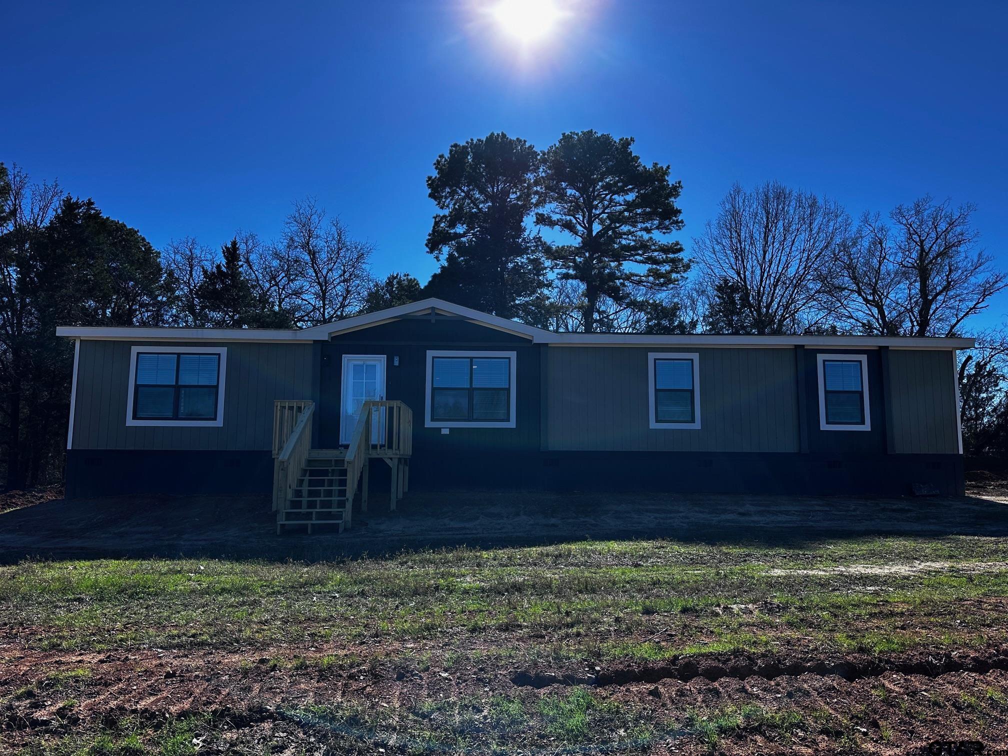 118 Private Road 5296 Alba, TX 75410 - Photo 1 of 25 a house view with a backyard space