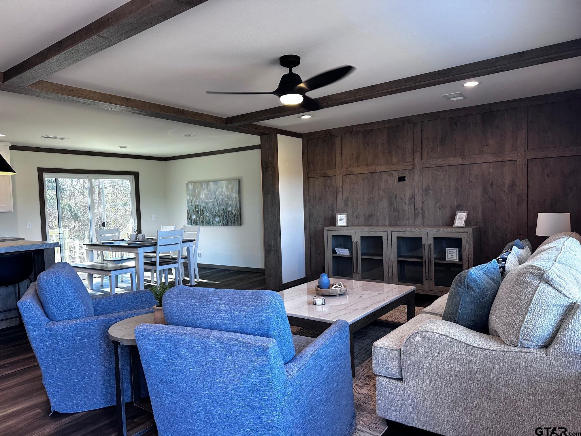 118 Private Road 5296 Alba, TX 75410 - Photo 2 of 25 a living room with furniture a chandelier and a table
