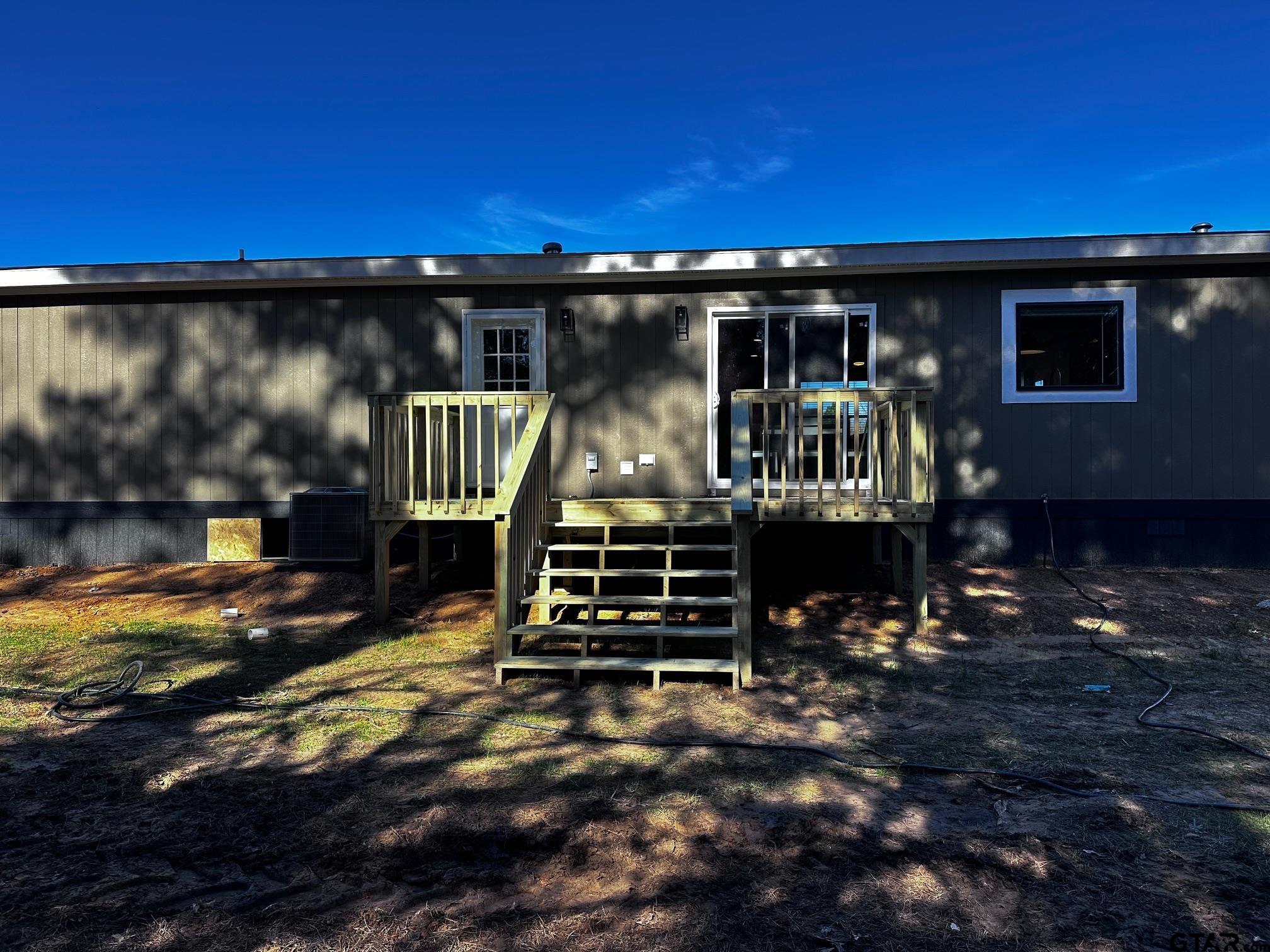 118 Private Road 5296 Alba, TX 75410 - Photo 21 of 25 a front view of a house with street
