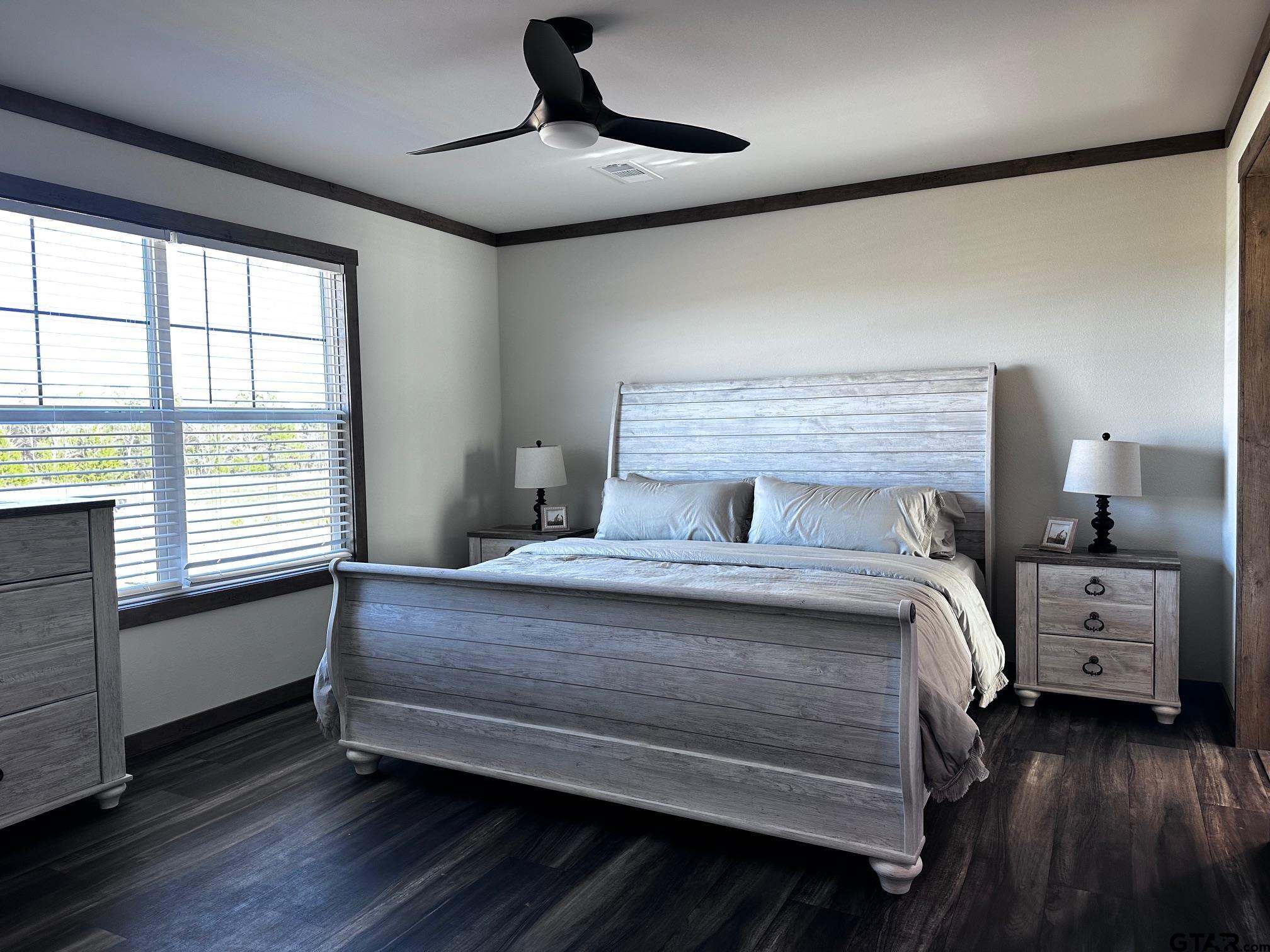 118 Private Road 5296 Alba, TX 75410 - Photo 8 of 25 a bedroom with a bed and a window