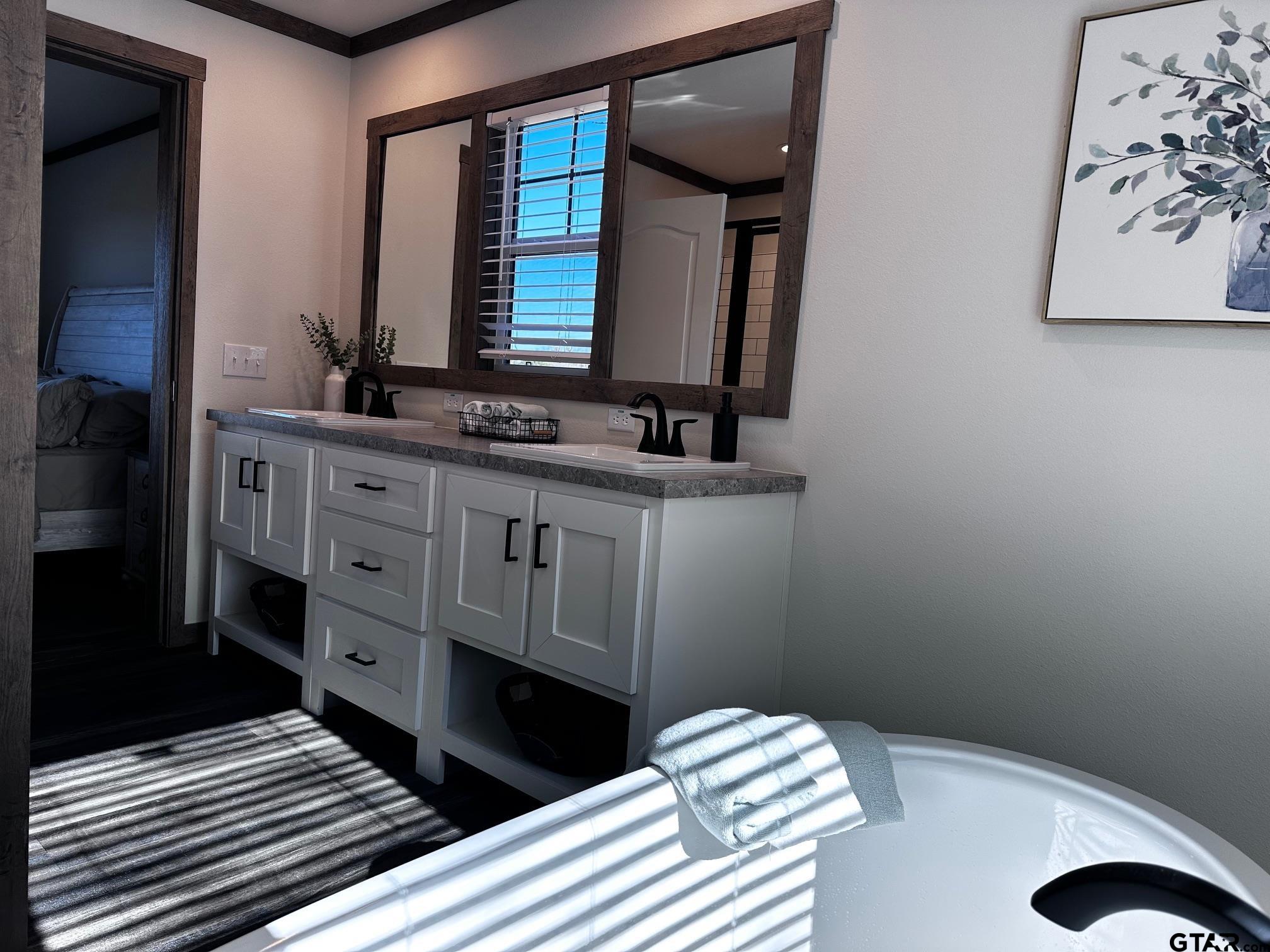 118 Private Road 5296 Alba, TX 75410 - Photo 10 of 25 a bathroom with a sink and a mirror