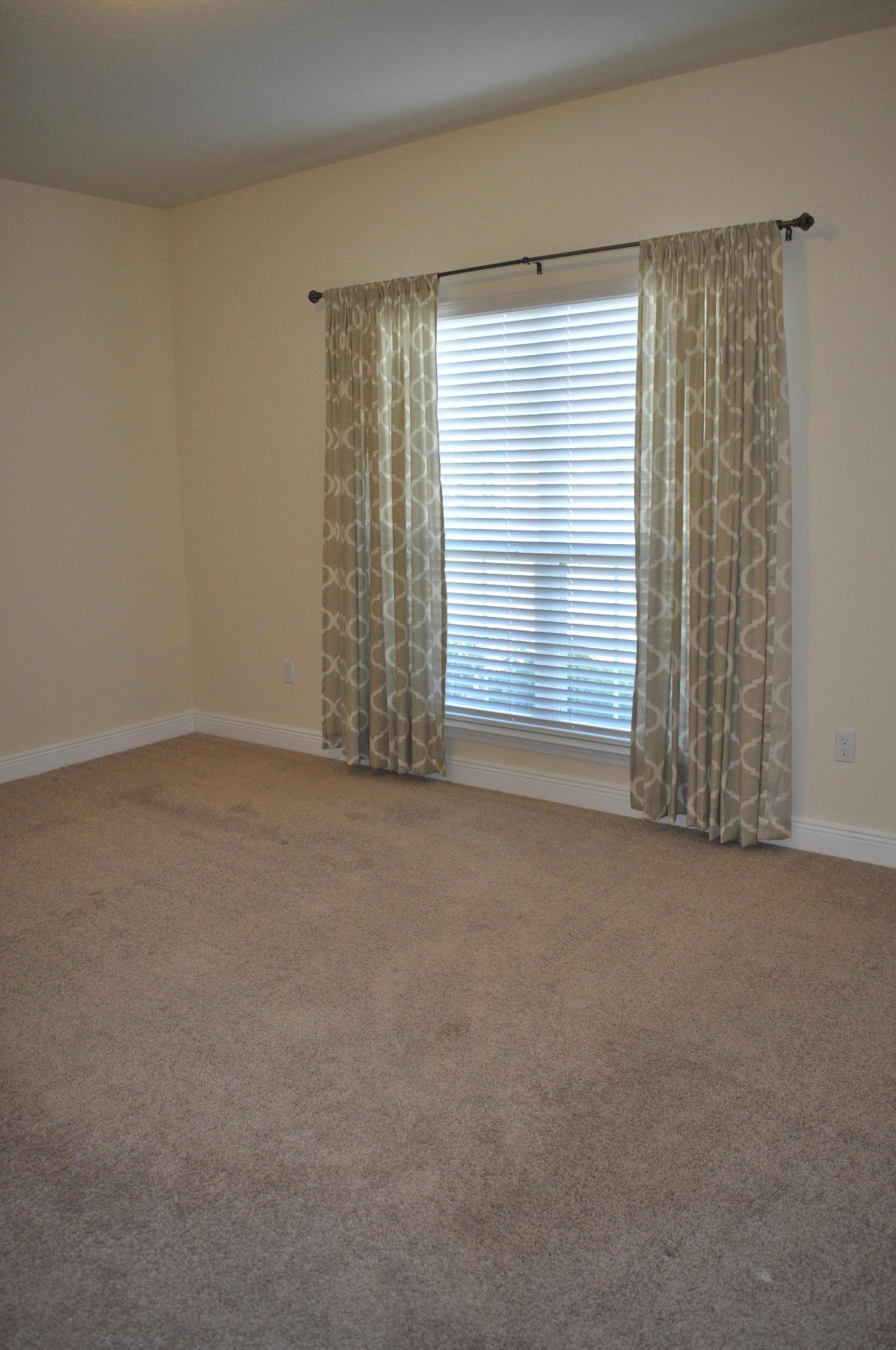 46 Nelly Street Freeport, FL 32439 - Photo 7 of 16 a view of an empty room with a window