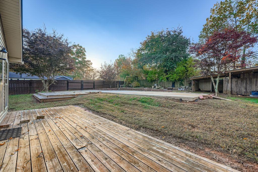 6431 Courtney Drive Winston, GA 30187 - Photo 20 of 22 a view of a yard with wooden deck