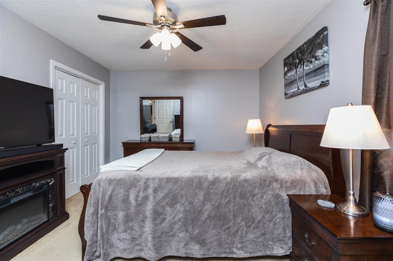 160 Buckboard Road Waynesboro, VA 22980 - Photo 14 of 34 a bedroom with a bed and a flat screen tv