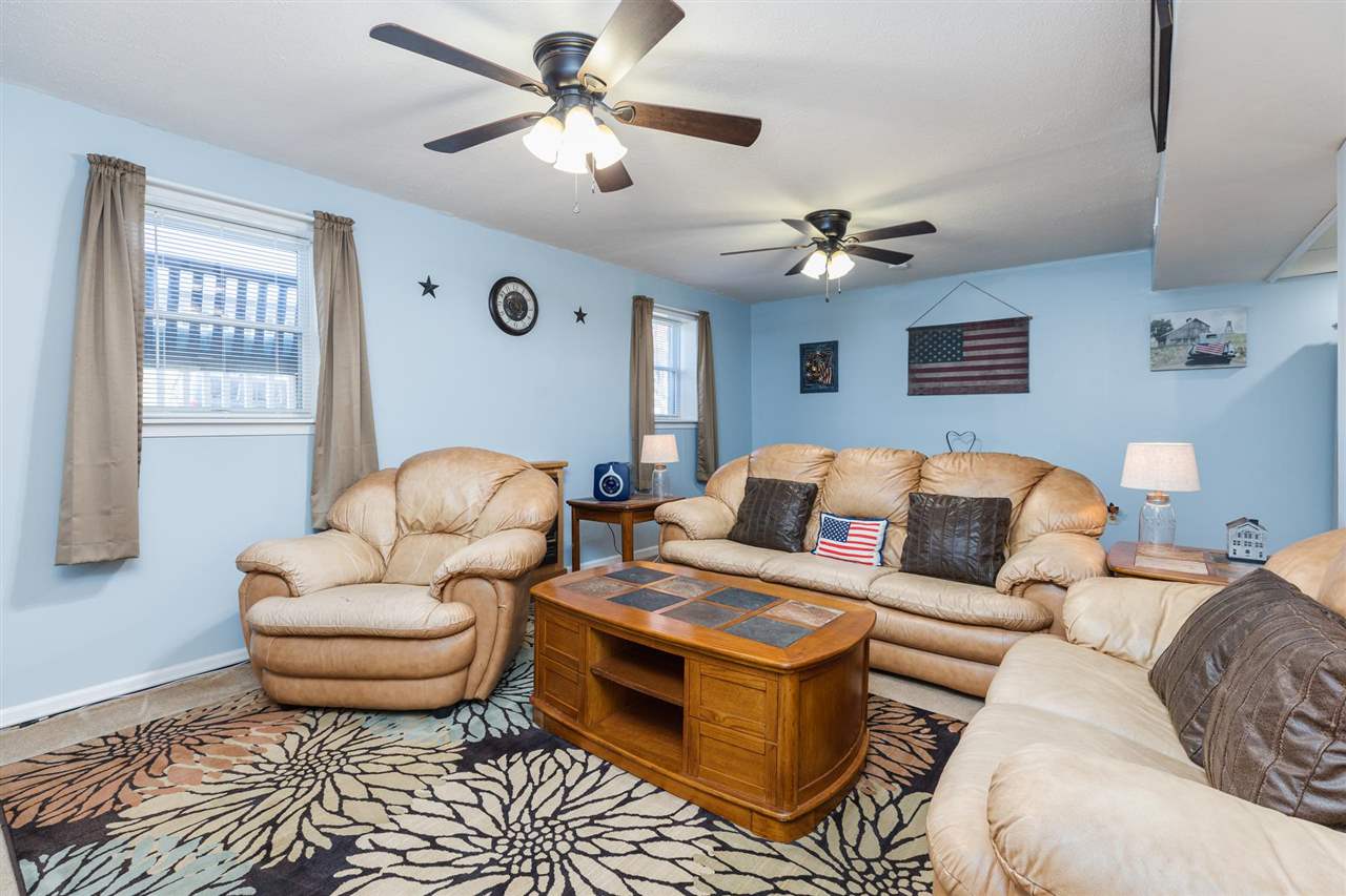 160 Buckboard Road Waynesboro, VA 22980 - Photo 20 of 34 a living room with furniture a rug and a window