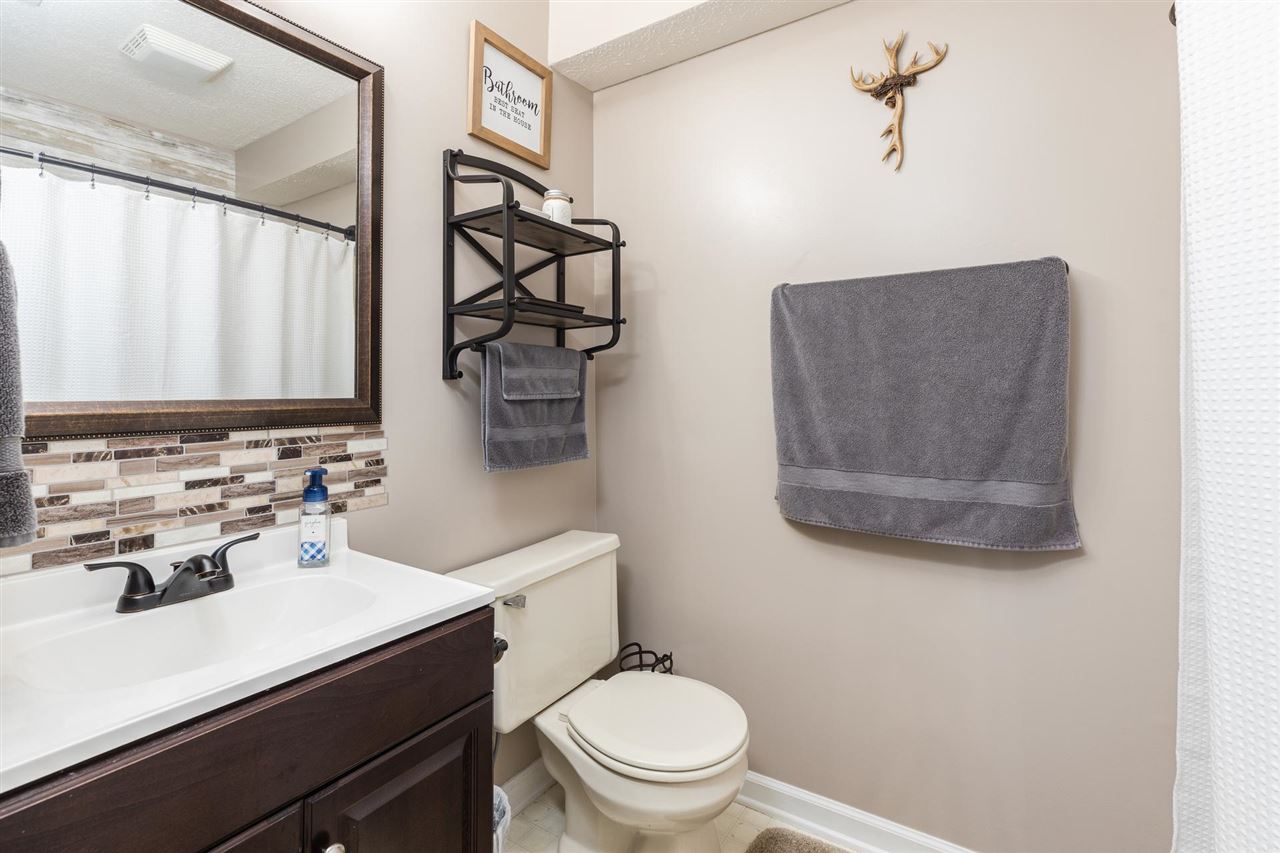 160 Buckboard Road Waynesboro, VA 22980 - Photo 22 of 34 a bathroom with a toilet sink and mirror