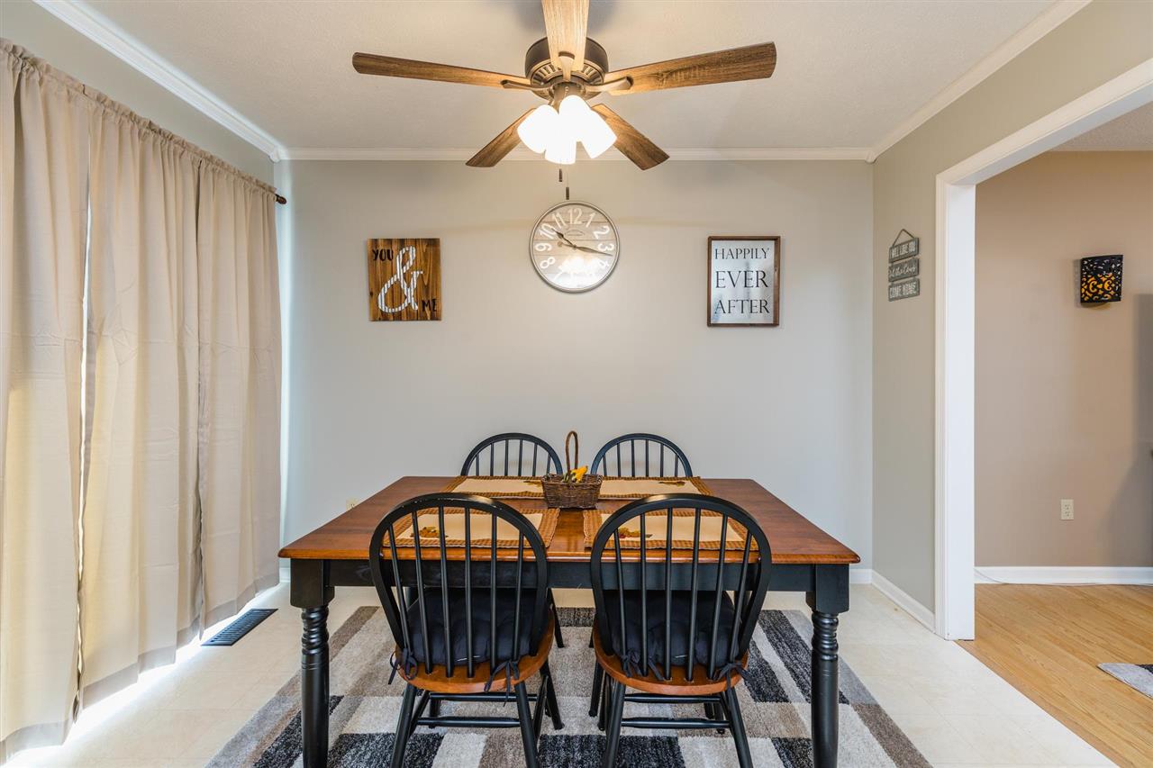 160 Buckboard Road Waynesboro, VA 22980 - Photo 4 of 34 a view of a dining room with furniture a chandelier and a window