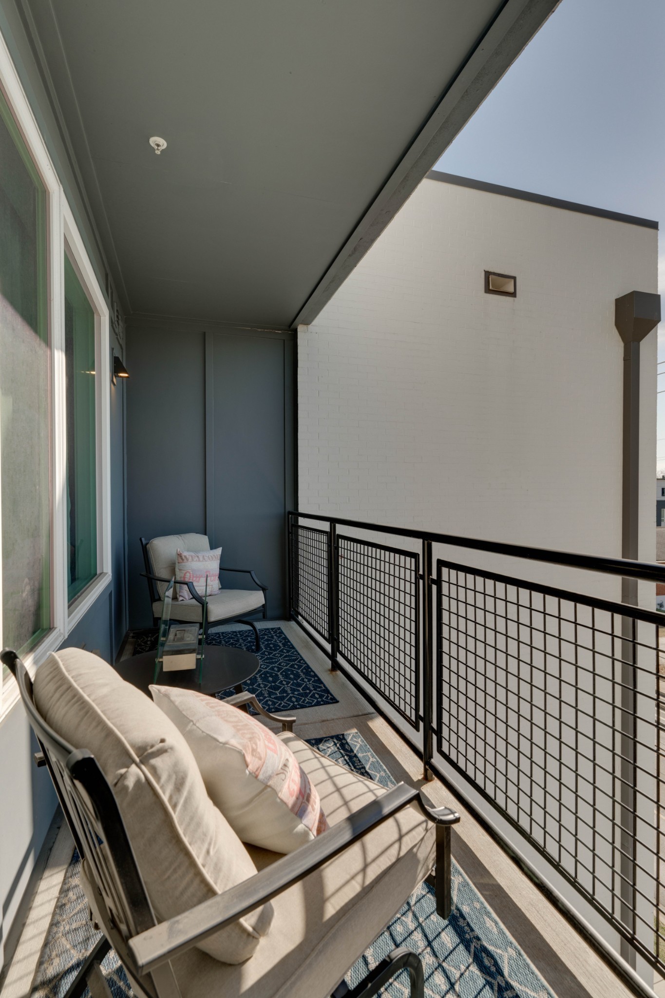 1041 East Trinity Lane, Unit 315 Nashville, TN 37216 - Photo 19 of 48 a view of a balcony with chairs