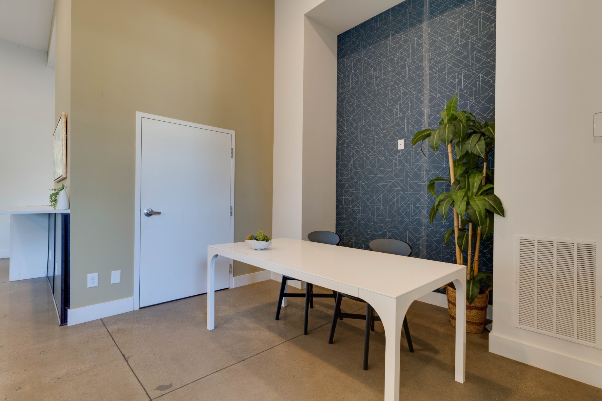 1041 East Trinity Lane, Unit 315 Nashville, TN 37216 - Photo 35 of 48 a workspace with furniture and a potted plant
