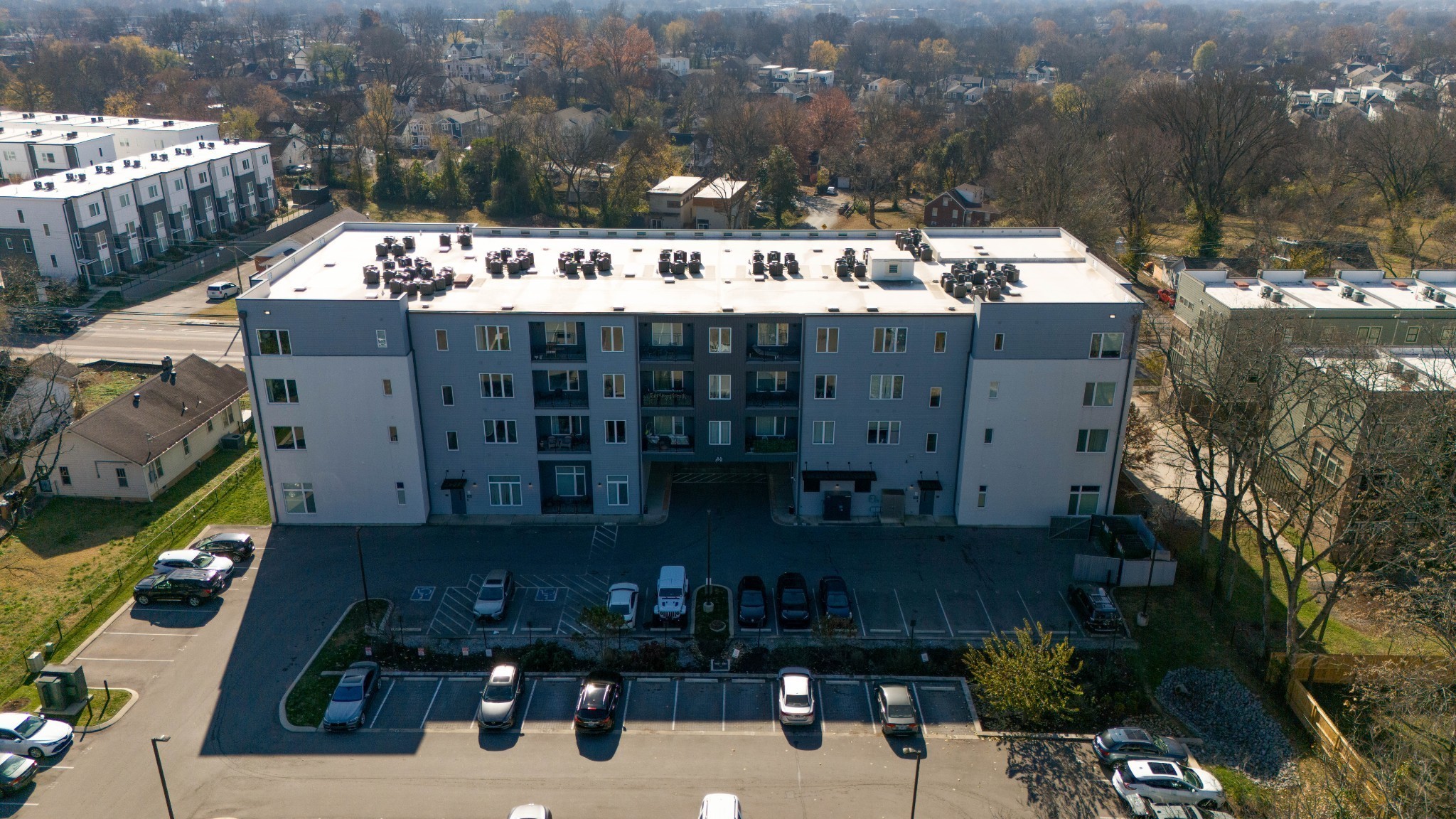 1041 East Trinity Lane, Unit 315 Nashville, TN 37216 - Photo 41 of 48 a view of a balcony with a plants and trees