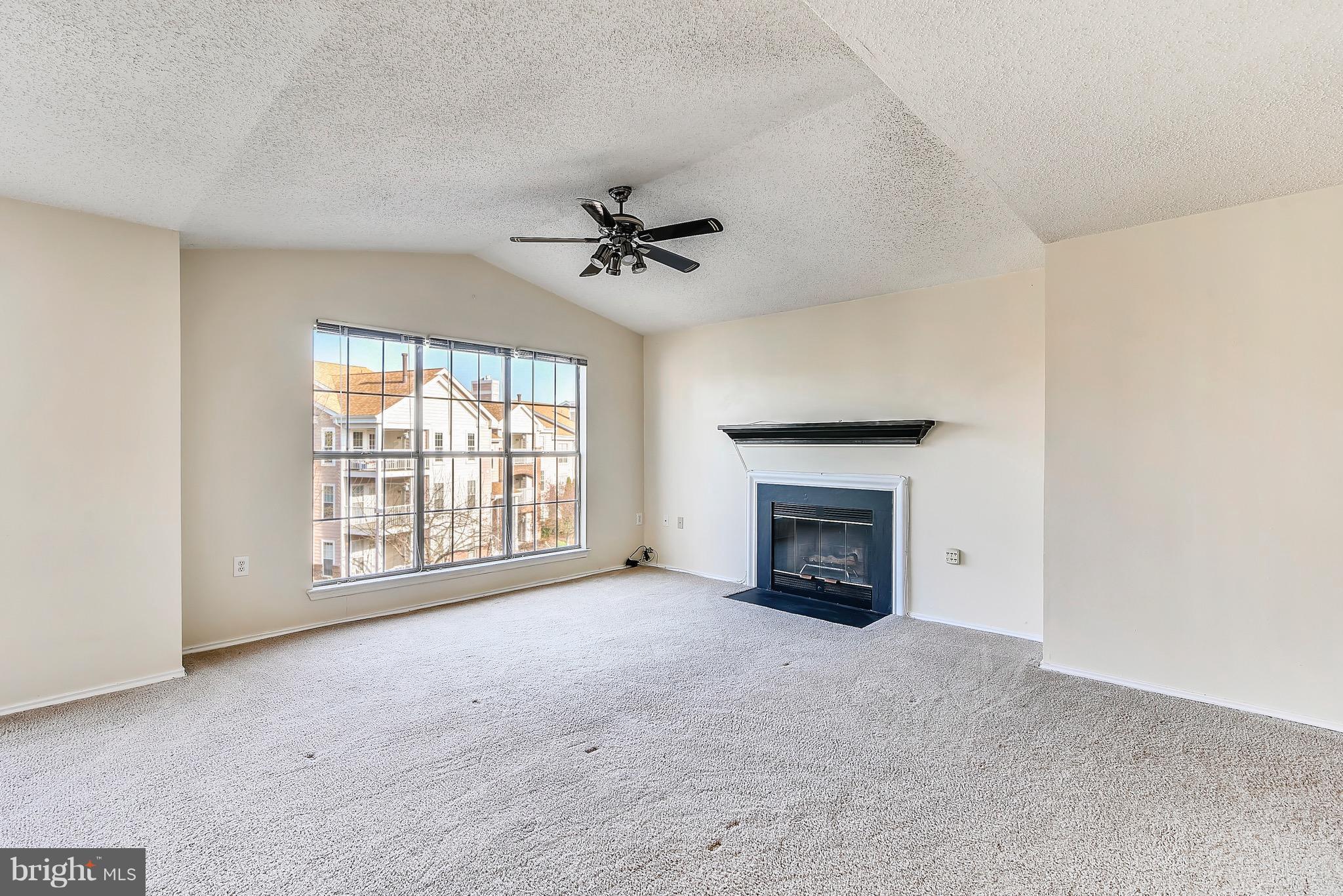 21023 Timber Ridge Terrace, Unit 304 Ashburn, VA 20147 - Photo 12 of 25 Family Room