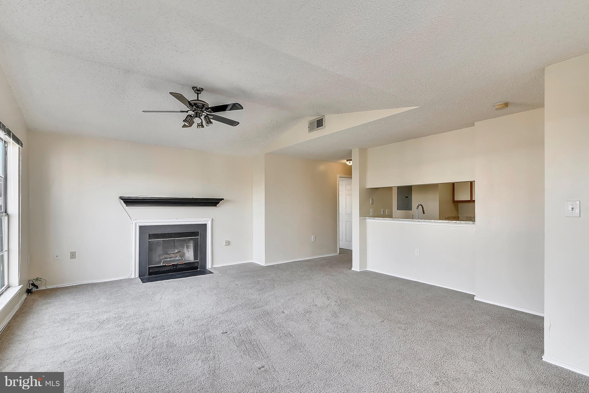 21023 Timber Ridge Terrace, Unit 304 Ashburn, VA 20147 - Photo 5 of 25 Family Room