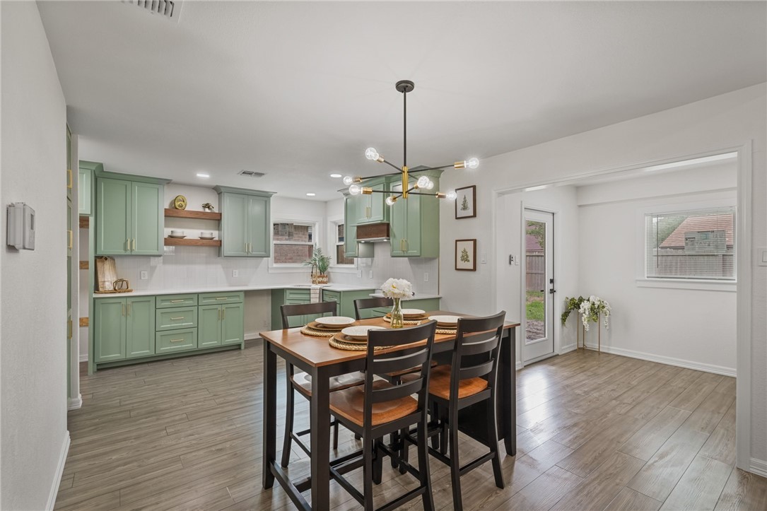5409 Timbergate Drive Corpus Christi, TX 78413 - Photo 11 of 29 a dining room with furniture and wooden floor