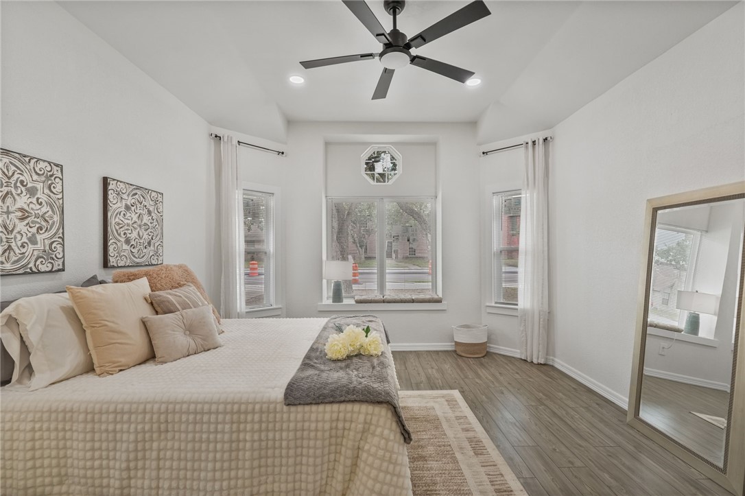 5409 Timbergate Drive Corpus Christi, TX 78413 - Photo 17 of 29 a bedroom with a large bed and a window