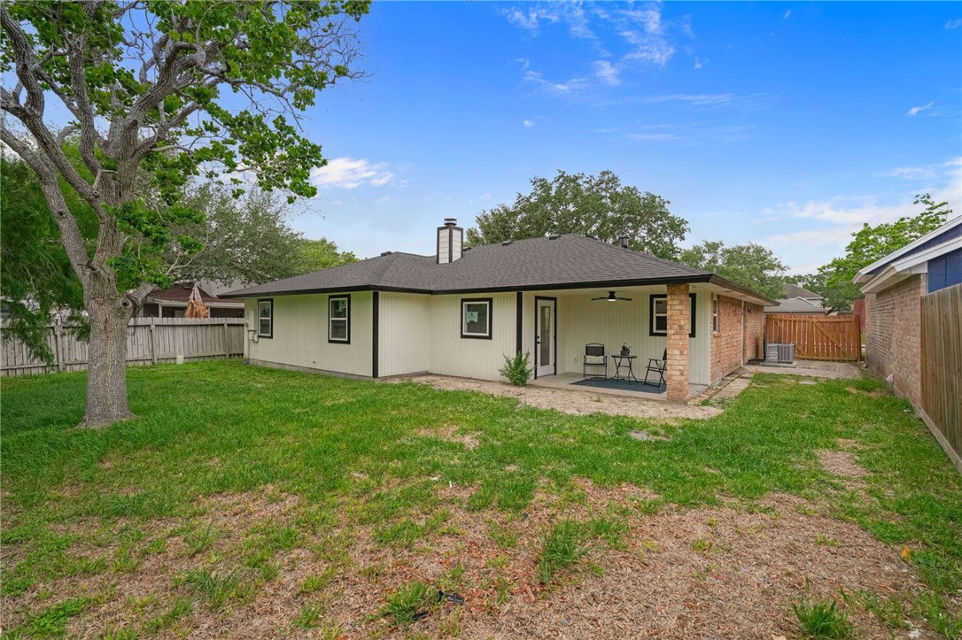 5409 Timbergate Drive Corpus Christi, TX 78413 - Photo 28 of 29 a front view of a house with a garden