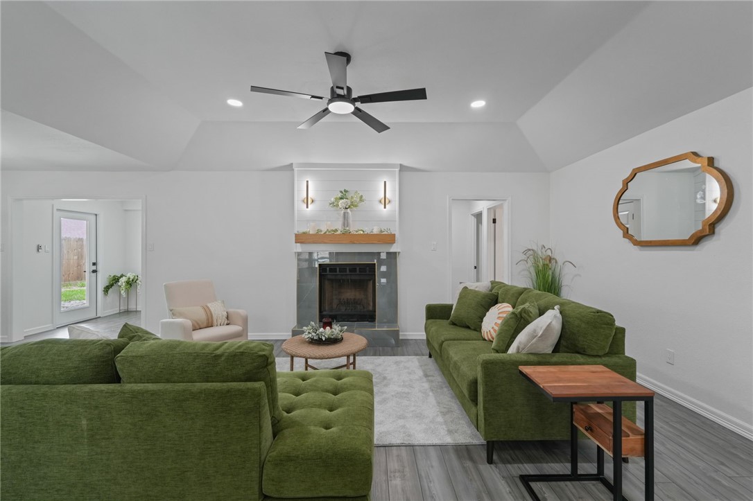 5409 Timbergate Drive Corpus Christi, TX 78413 - Photo 3 of 29 a living room with furniture and a fireplace