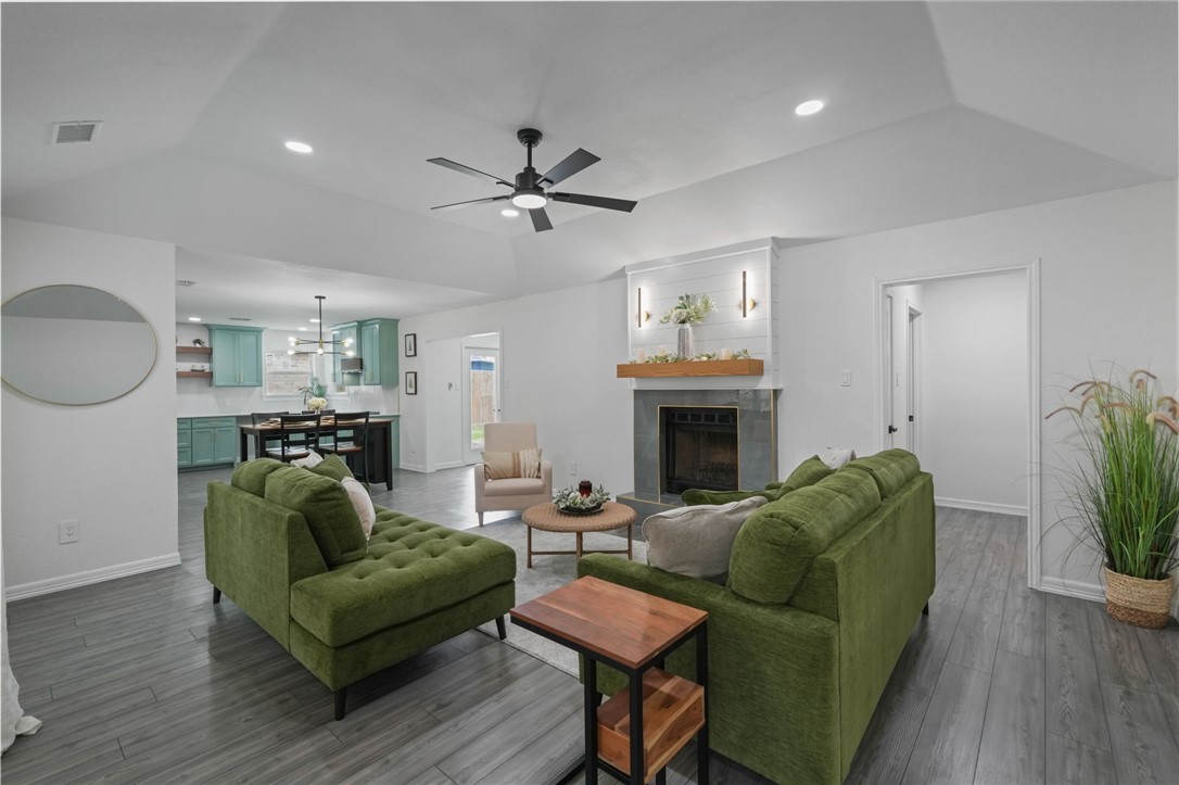5409 Timbergate Drive Corpus Christi, TX 78413 - Photo 4 of 29 a living room with furniture and a fireplace