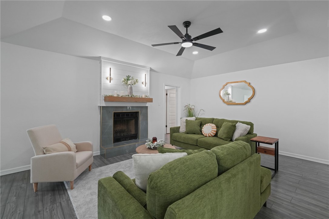 5409 Timbergate Drive Corpus Christi, TX 78413 - Photo 5 of 29 a living room with furniture and a fireplace