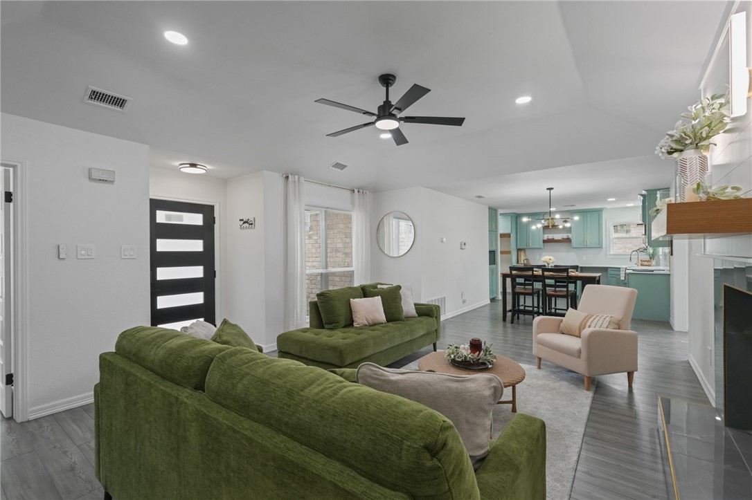 5409 Timbergate Drive Corpus Christi, TX 78413 - Photo 8 of 29 a living room with furniture and a fireplace