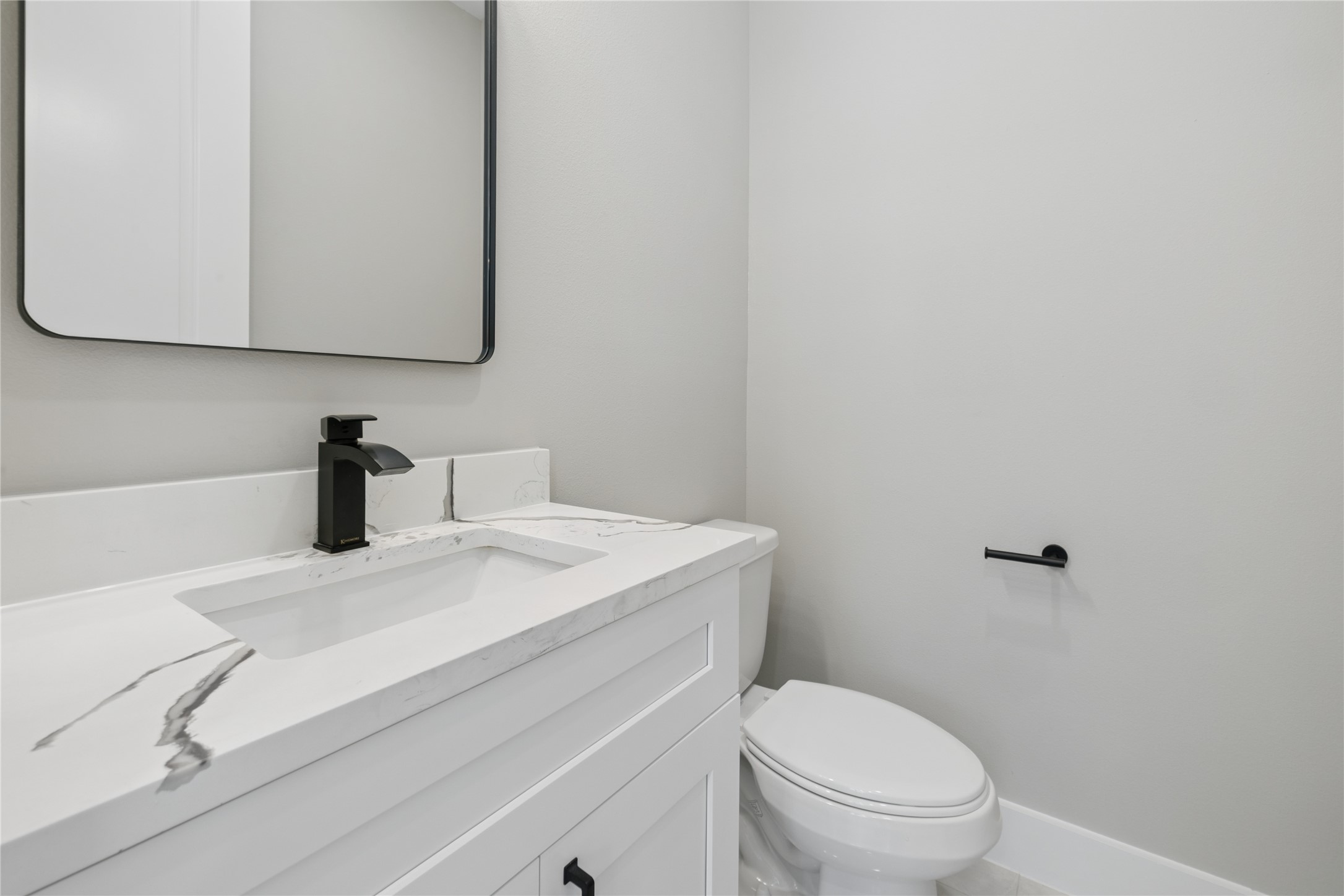 20019 Venetto St Spring Spring, TX 77388 - Photo 18 of 35 a bathroom with a sink a toilet and mirror