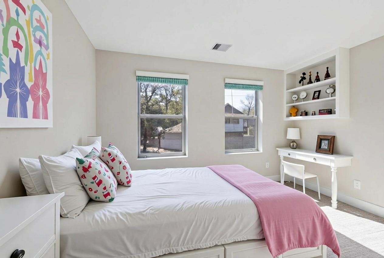 20019 Venetto St Spring Spring, TX 77388 - Photo 25 of 35 a bedroom with a bed and a window