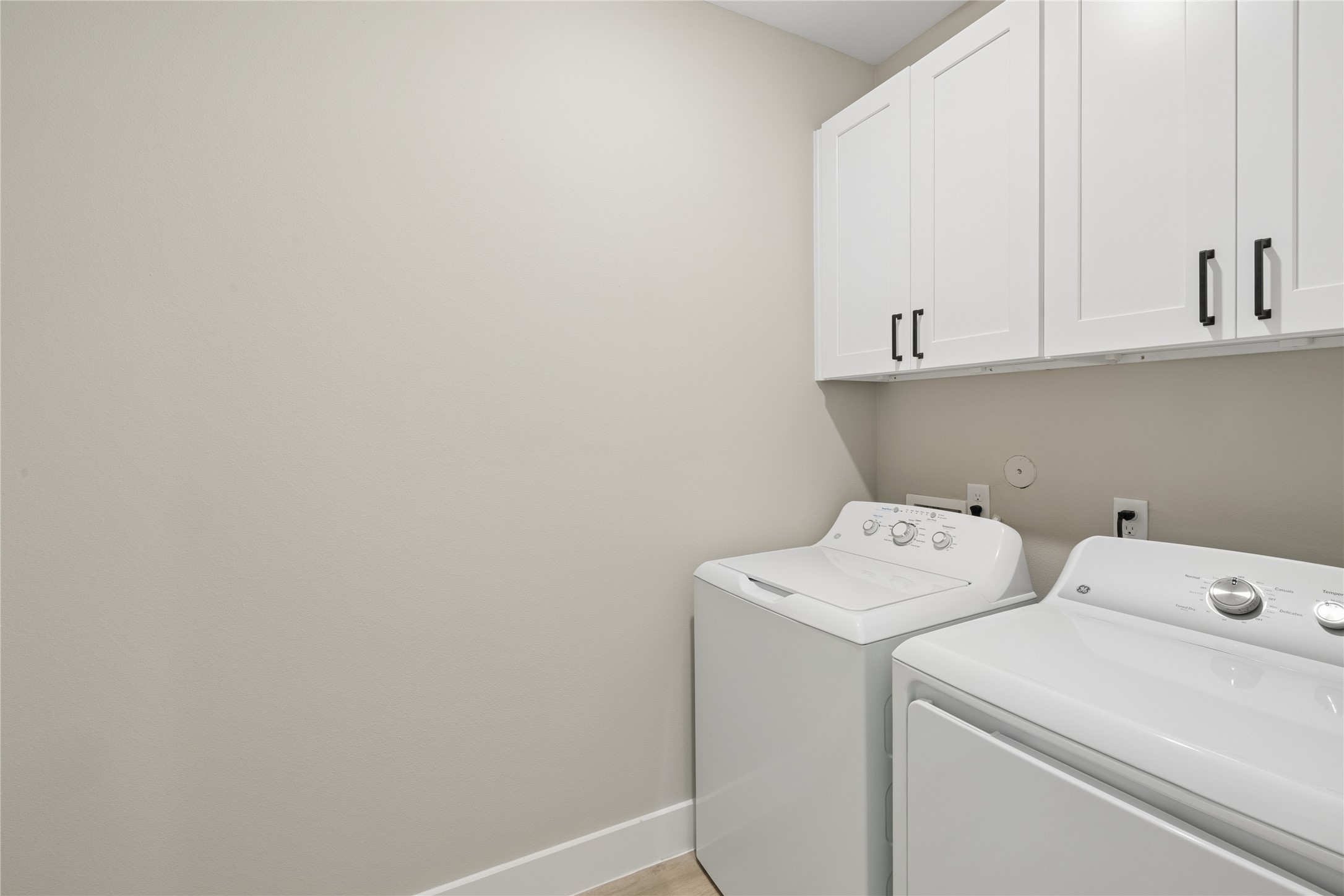 20019 Venetto St Spring Spring, TX 77388 - Photo 26 of 35 a utility room with dryer and washer