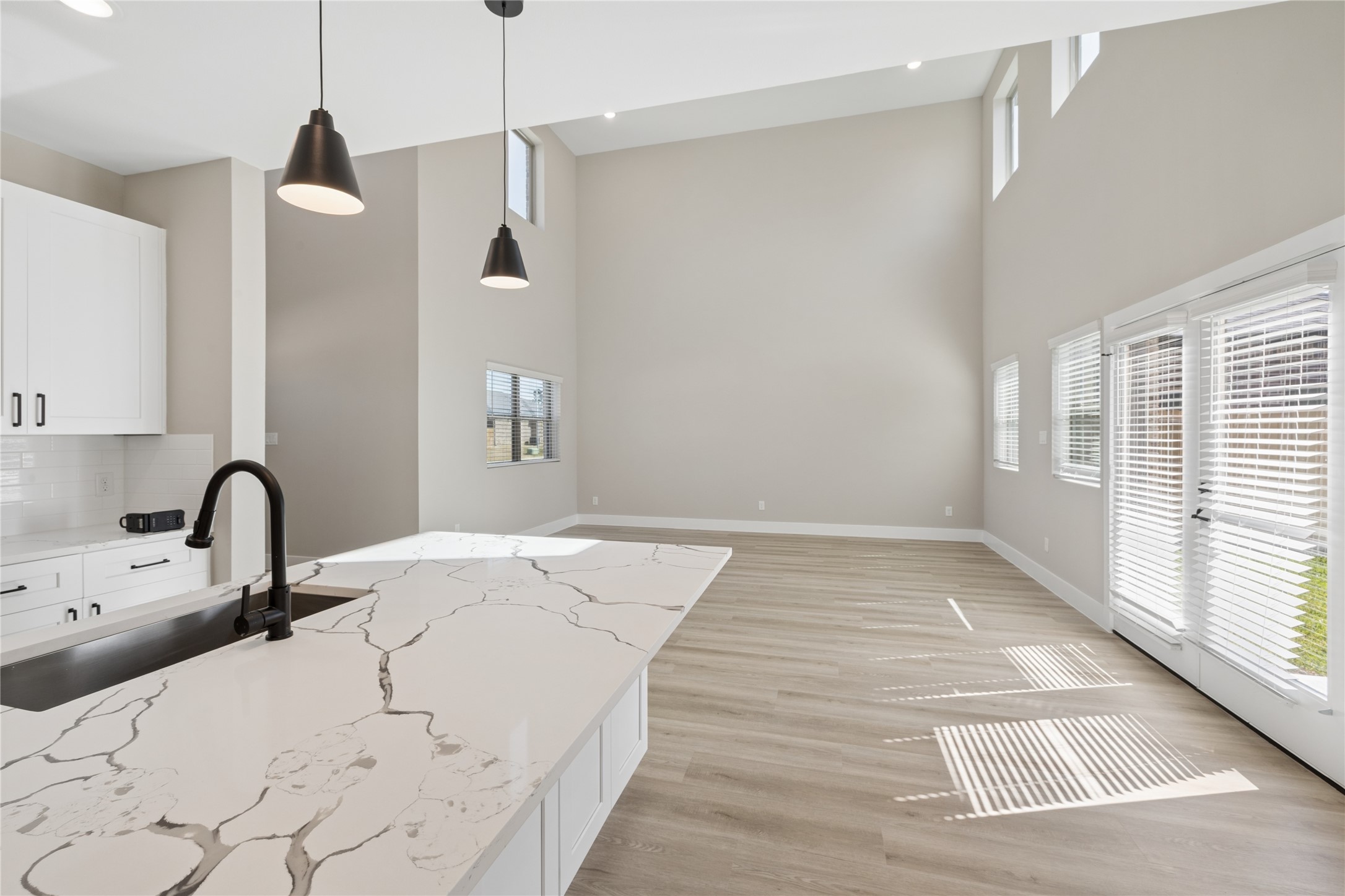 20019 Venetto St Spring Spring, TX 77388 - Photo 7 of 35 kitchen looking into the family room