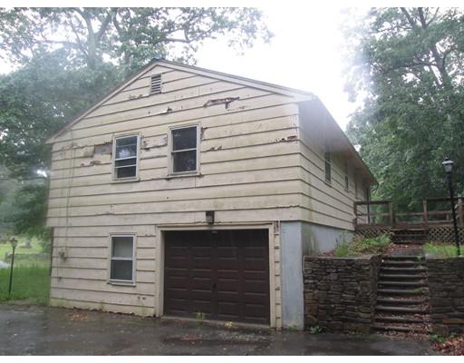 17 Lower Gore Road Webster, MA 01570 - Photo 2 of 11 a front view of a house