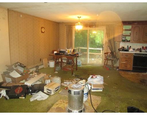 17 Lower Gore Road Webster, MA 01570 - Photo 5 of 11 a living room with furniture and a large window