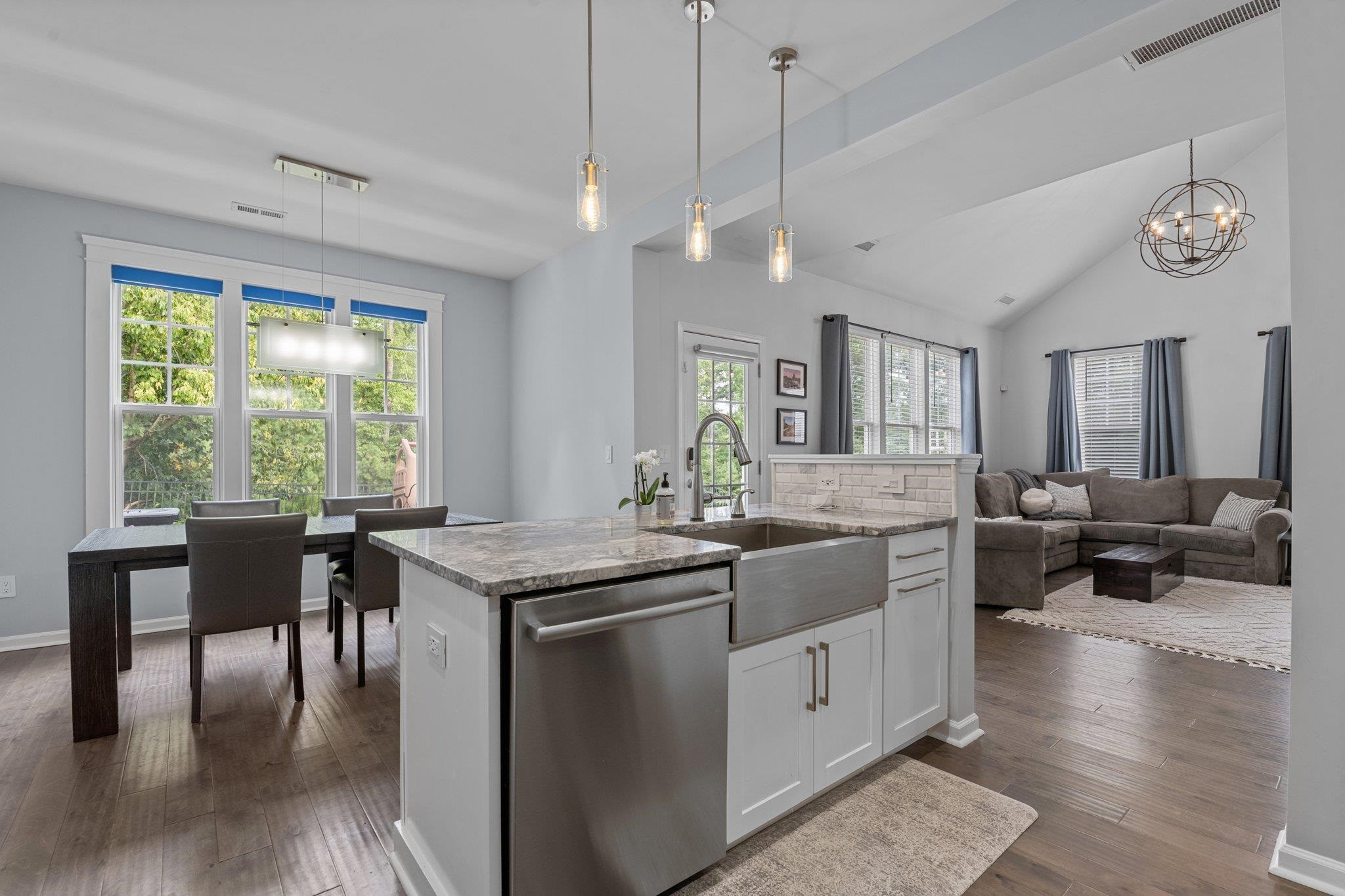 7718 Cape Charles Drive Raleigh, NC 27617 - Photo 13 of 43 a kitchen with granite countertop lots of counter top space