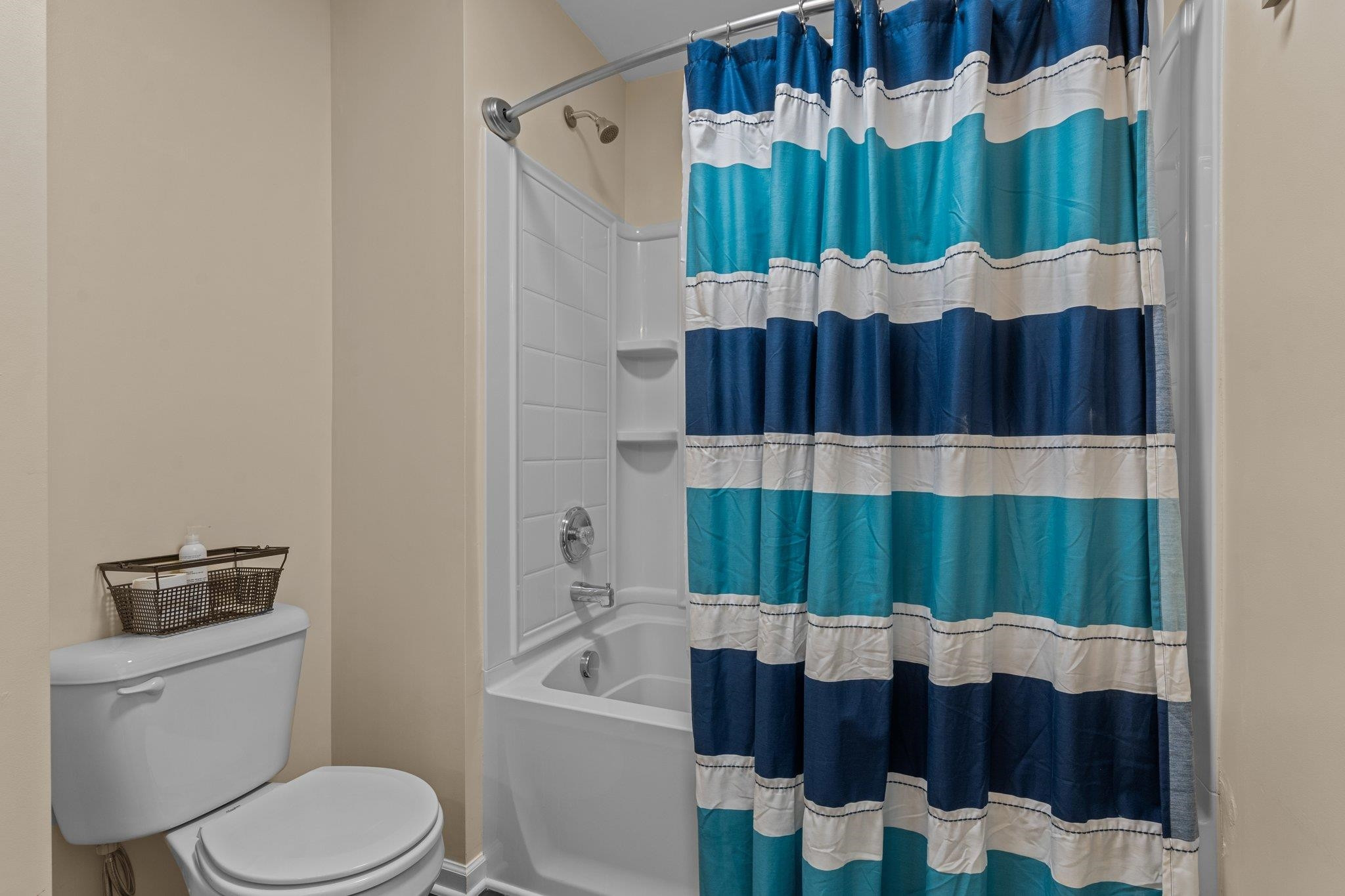 7718 Cape Charles Drive Raleigh, NC 27617 - Photo 29 of 43 a bathroom with a sink toilet and shower