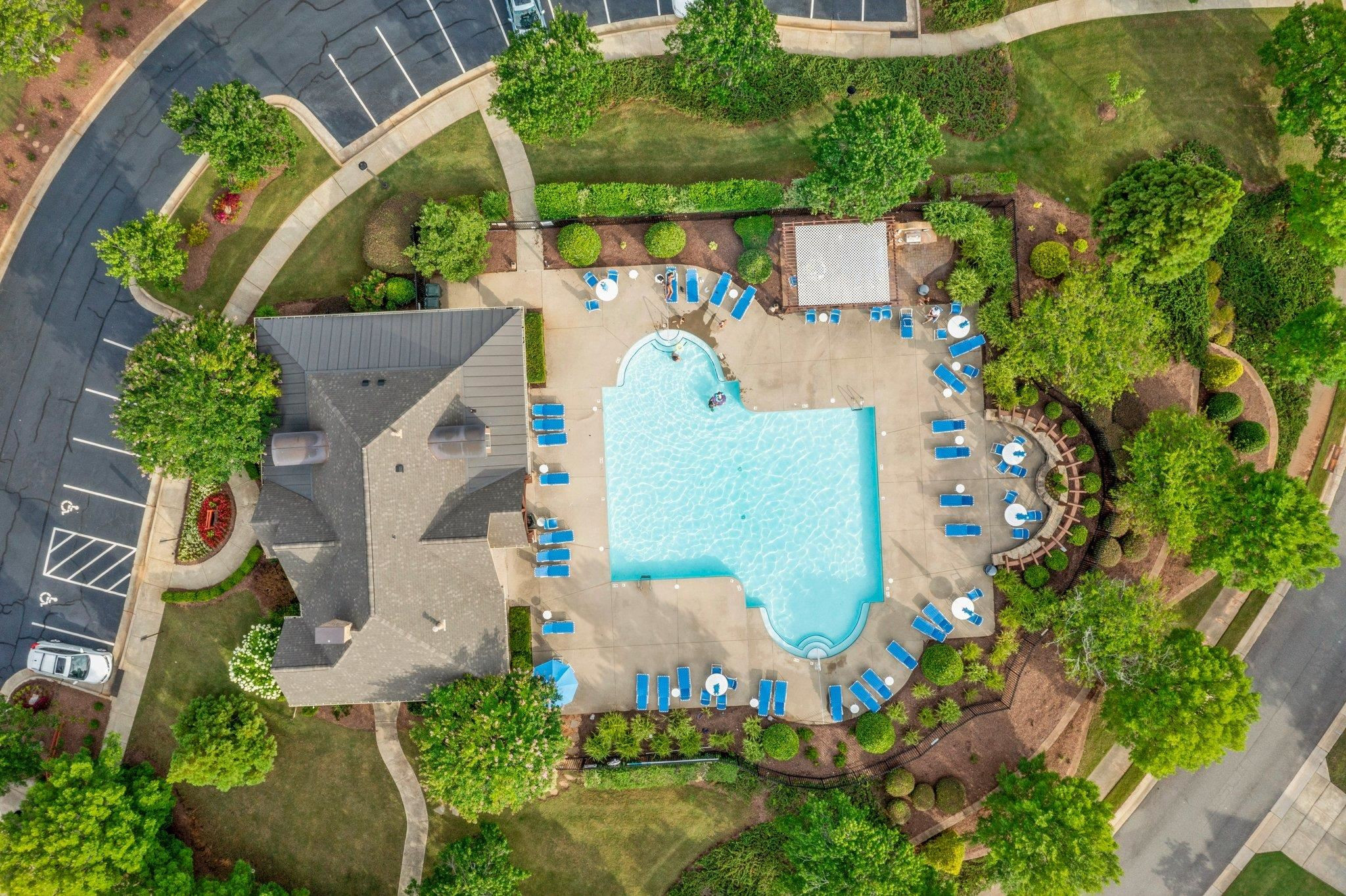 7718 Cape Charles Drive Raleigh, NC 27617 - Photo 39 of 43 an aerial view of a house with a yard and a fountain
