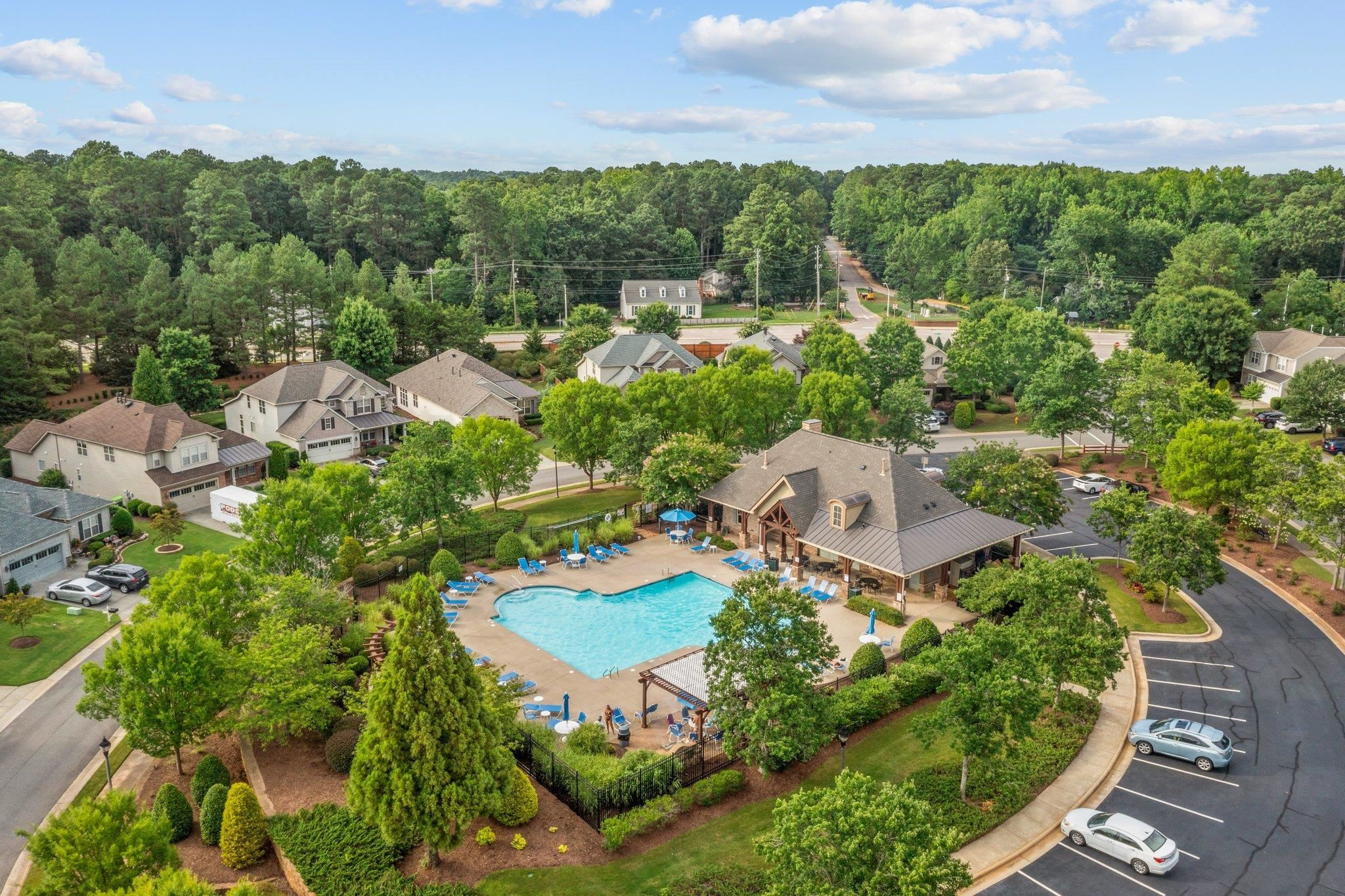 7718 Cape Charles Drive Raleigh, NC 27617 - Photo 40 of 43 an aerial view of a house with garden space and outdoor seating