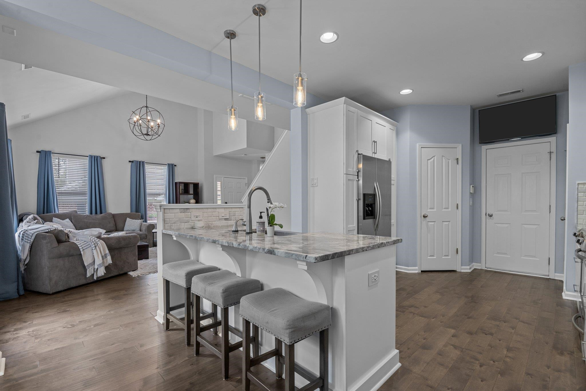 7718 Cape Charles Drive Raleigh, NC 27617 - Photo 7 of 43 a large kitchen with a table and chairs