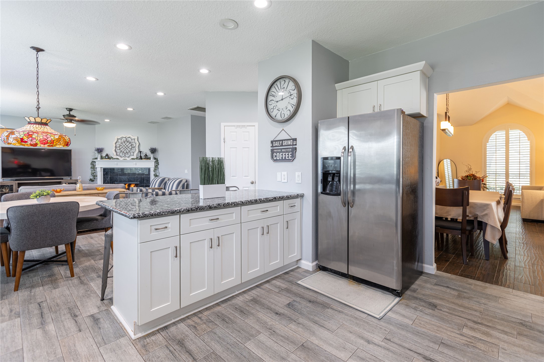 5922 Walkabout Way Katy, TX 77450 - Photo 14 of 38 Kitchen features a breakfast bar, perfect for casual dining and entertaining