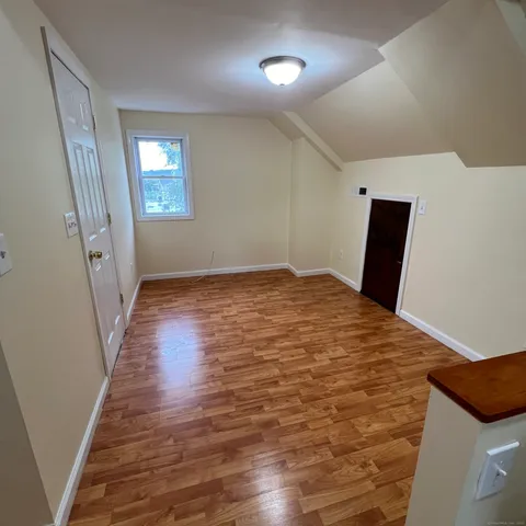 a bathroom with a sink toilet and a mirror