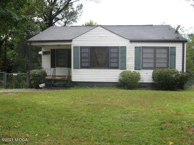 3839 Mathis Street Macon, GA 31206 - Photo 1 of 3 a front view of a house with garden