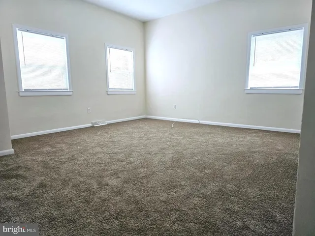 an empty room with window